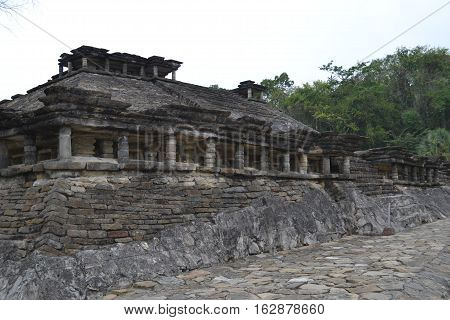Ruins and pyramids during a thunderstorm at the pre-Columbian archeological site El Tajin in Papantla, Veracruz, Mexico