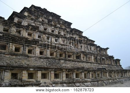 Pyramid of the Niches at the pre-columbian archeological site known as El Tajin located in Papantla, Veracruz, Mexico taken during a thunderstorm