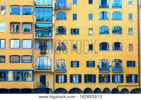 Facades Of Old Buildings Along The River Arno In Florence, Italy