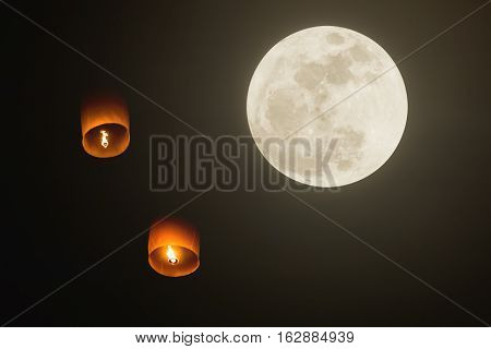Yee peng floating lanterns and supper full moon Thailand multiple exposure technique