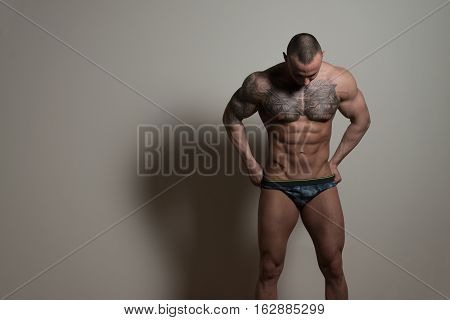 Portrait Of A Handsome Young Man In Underpants
