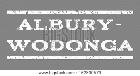 Albury-Wodonga watermark stamp. Text caption between horizontal parallel lines with grunge design style. Rubber seal stamp with scratched texture. Vector white color ink imprint on a gray background.