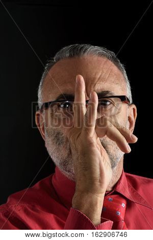 portrait of a Mocking man with black background