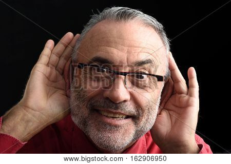 portrait of a Mocking man with a black background