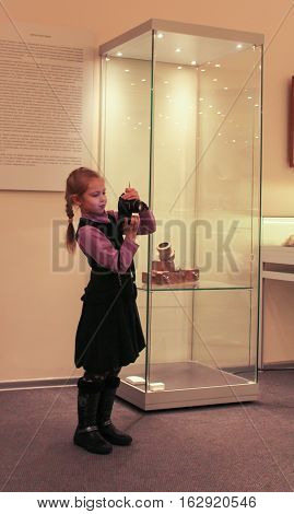 Gatchina, Russia - 3 December, Little photographer in the museum, 3 December, 2016.
Visit the Museum Reserve Gatchina Palace.