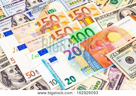 Money background from euro banknotes and american dollars