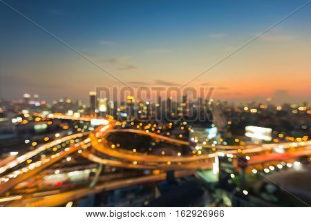 Blurred light aerial view highway intersection skyline abstract background