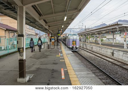 TOKYO, JAPAN - 20 NOV 2016 : Train stopped at Fujikyu Railway station.The railway system is one of the most important public transportation in Japan.