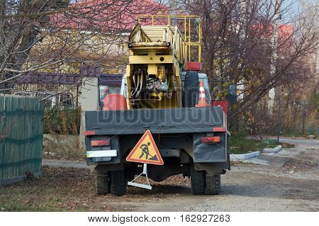 Repair truck with turntable ladder and tower. Work truck. Boom lift.