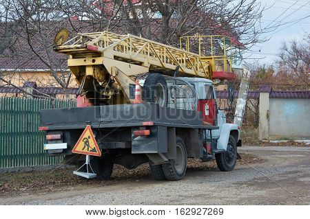 Repair truck with turntable ladder and tower. Work truck. Boom lift.