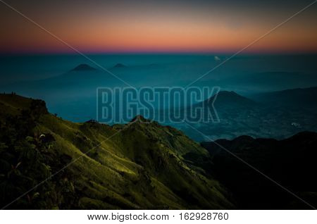 Stratovolcano And Mountains In Morning Fog