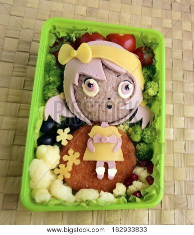 The girl is made of rice. Creative food for good mood and appetite. Kyaraben, bento, chib