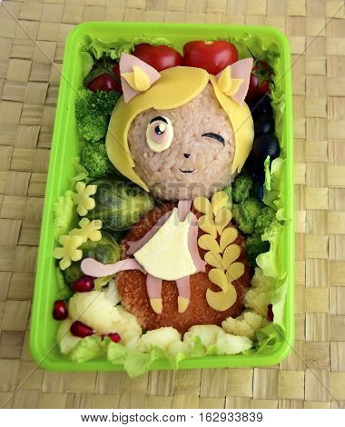 The girl a cat is made of rice. Creative food for good mood and appetite. Kyaraben, bento