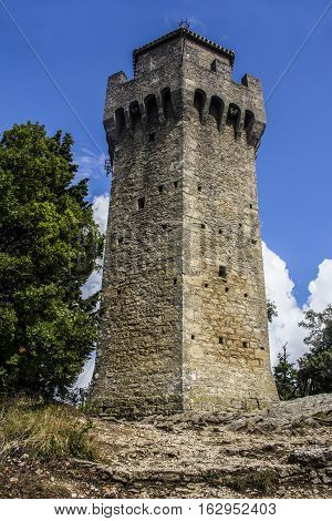 Republic of San Marino landscape: the ancient The Watch tower , one of the three towers on a peak of Monte Titano