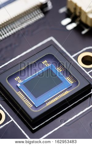 Security camera censor chip on electronic circuit board. Macro shot