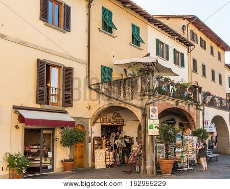 Greve in Chianti Italy - Oct 4 2016. People browsing in the Piazza Giacomo Matteotti in the city of Grave.