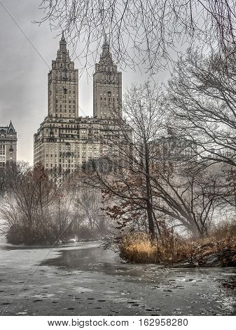 Central Park New York City on foggy morning fter snow storm