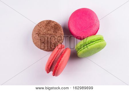 Macaroons for dessert on a white background shot closeup