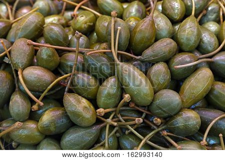 Green Pickled Big Capers Close Up Background