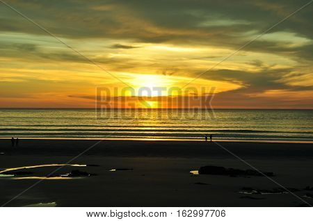 sunrise at cloudy lowtide, wells beach, maine