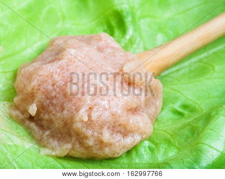 Caviar Of Zander In Wooden Spoon On Green Leaf
