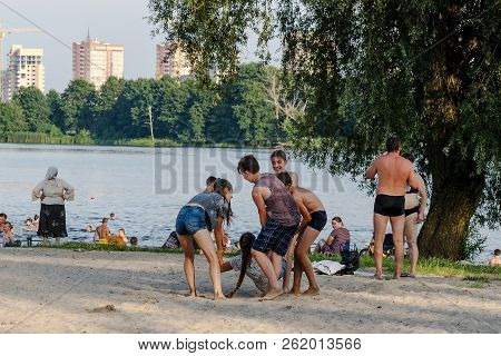 Brest, Belarus - July 30, 2018: Teens Play On The City Beach In Brest