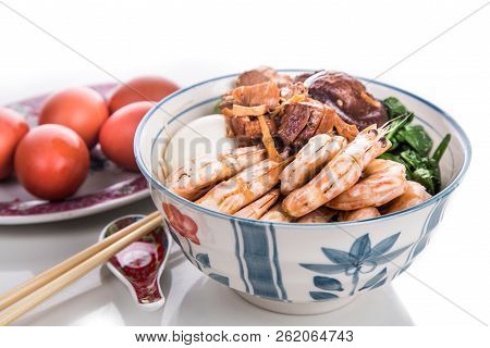 Bowl Of Chinese Birthday Noodle With Seafood, Meat, Red Eggs