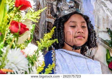 Cuidad Vieja,, Guatemala -  December 7, 2017: Girl Wearing Crown On Parade Float Celebrating Our Lad