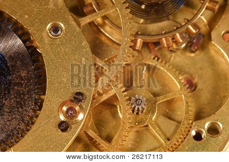 Closeup of the interlocking gears of a pocket watch