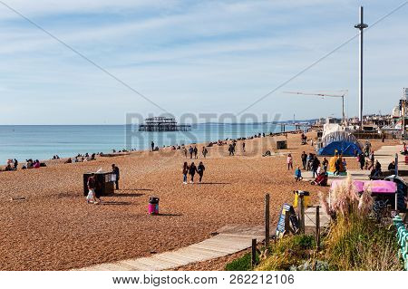 Brighton, England, October 07, 2018. People On On Busy Shingle Beach In Brighton, The British Airway
