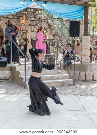 Jerusalem, Israel, September 29, 2018 : Dancer In A Black Authentic Dress Dances To The Music For Vi