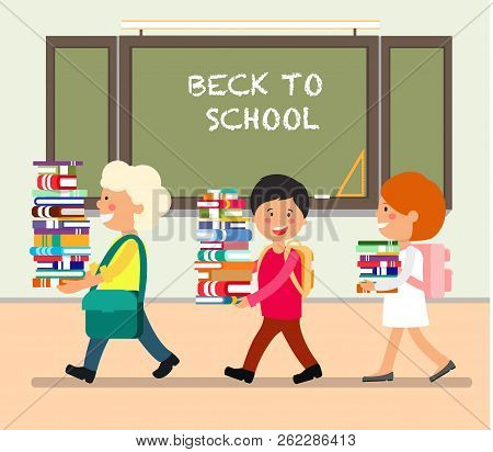 Happy Kids With Books In Classroom. Study At School. Back To School In September. Schooling Concept.