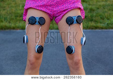 Kiev Ukraine September 21, 2018: Compex Pacemaker For Fitness. Install Electrostimulator On The Musc