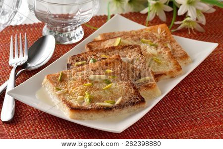 Shahi Tukrey, A Delicious And Yummy Bread Pudding Dipped In Condensed Cold Milk For A Mouth Melting 