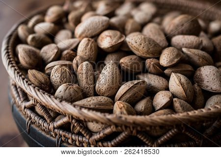 Crusted Almonds In A Rustic Bowl.