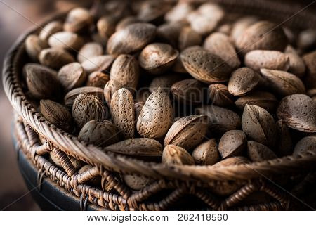 Crusted Almonds In A Rustic Bowl.