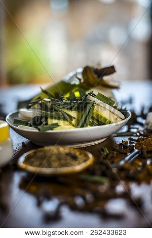 Close Up Of Organic Salad Of White Radish With Spring Onions,olive Oil,black Pepper,salt And Clove P