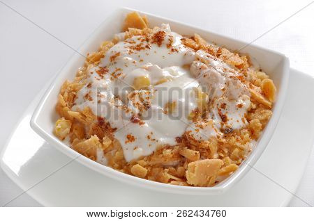 Dahi Bhallay, A yogurt base deleciuos street snack available with plain spicy, mix chat, papri, meet
