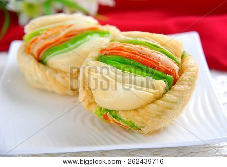 Malai Khaja, Khoya Or Cream Filled Inside, Sweet And Crusty Outside.