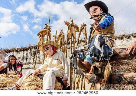 Cuidad Vieja,, Guatemala -  December 7, 2017: Locals In Traditional Folk Masks & Costumes On Parade 