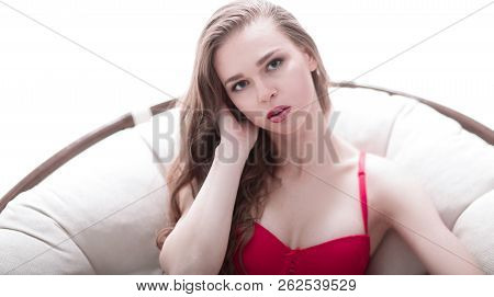 Close Up.beautiful Young Woman Sitting In Papasan Chair