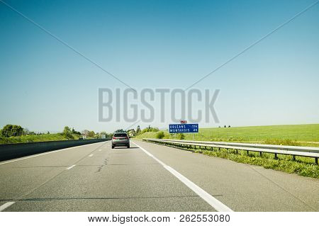 Rear View Of Car Driving Fast To Montargis And Orleans On French Highway On A Spring Bright Day - De