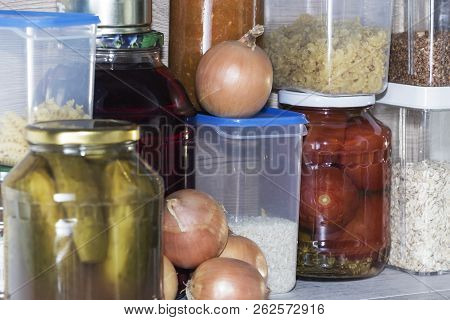 Storage Shelves In Pantry With Homemade Canned Preserved Fruits And Vegetables