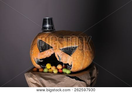 Halloween Demon. Demon Pumpkin With Horror Face And Halloween Hat. Traditional Decoration For All Sa