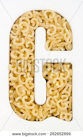 Capital Letter  Gmade up from  alphabet  pasta  macro image 