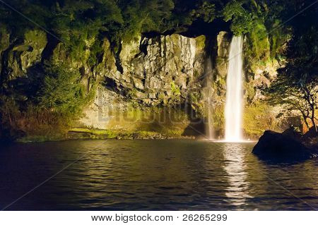 Night view of famous Cheonjiyeon Falls on Jeju Island of South Korea