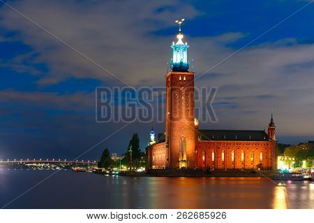 Stockholm City Hall Or Stadshuset At Night In The Old Town In Stockholm, Capital Of Sweden