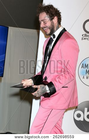 LOS ANGELES - OCT 9:  Post Malone at the 2018 American Music Awards at the Microsoft Theater on October 9, 2018 in Los Angeles, CA