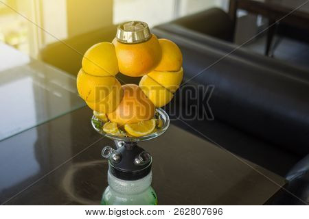 Beautiful Glass Hookah, With A Fruit Bowl, Consisting Of Oranges And Grapefruit.