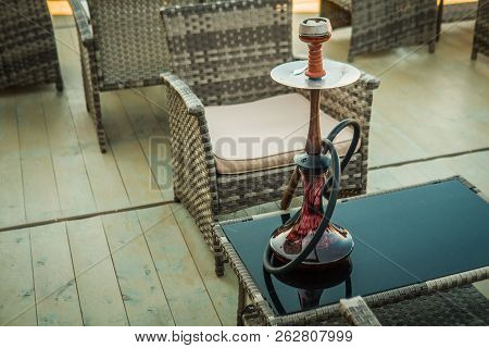 Beautiful New Hookah On The Table On The Summer Terrace. Hookah Russian Production.